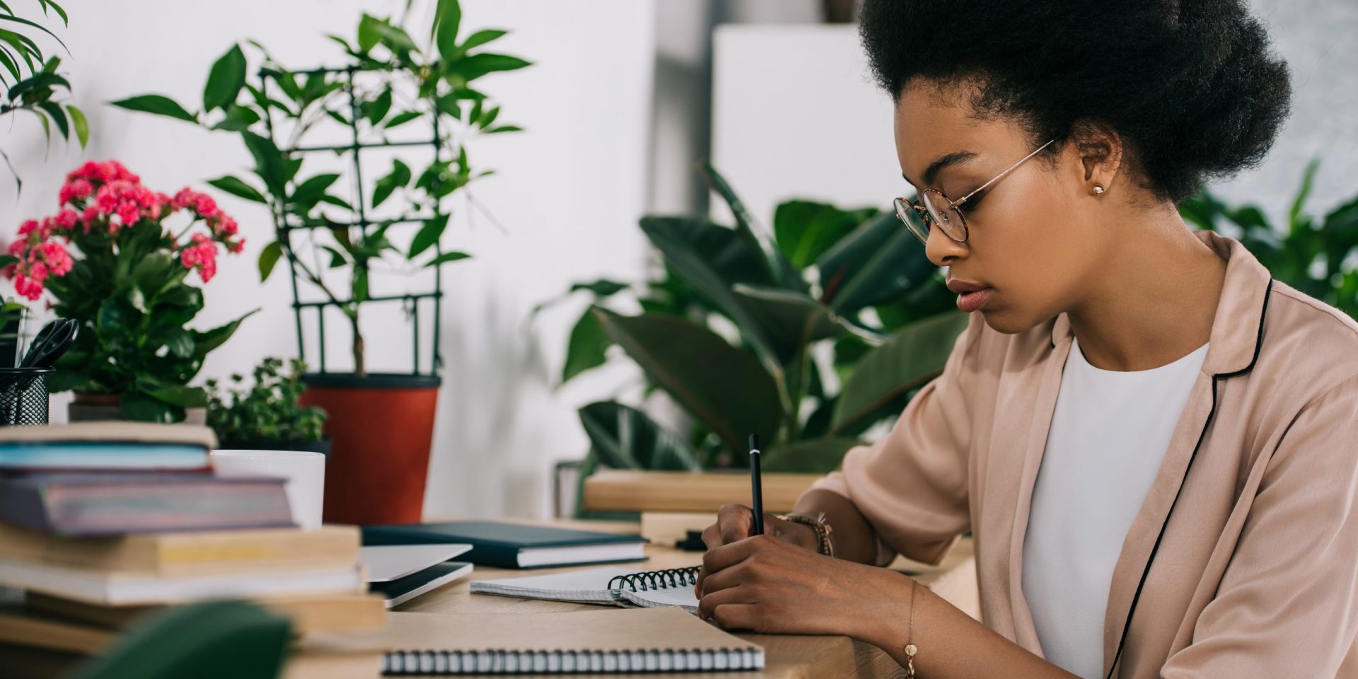 Pensive woman journaling