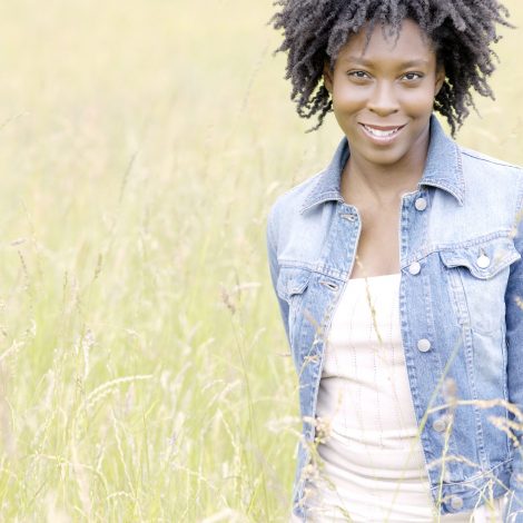 Woman smiling in the grass