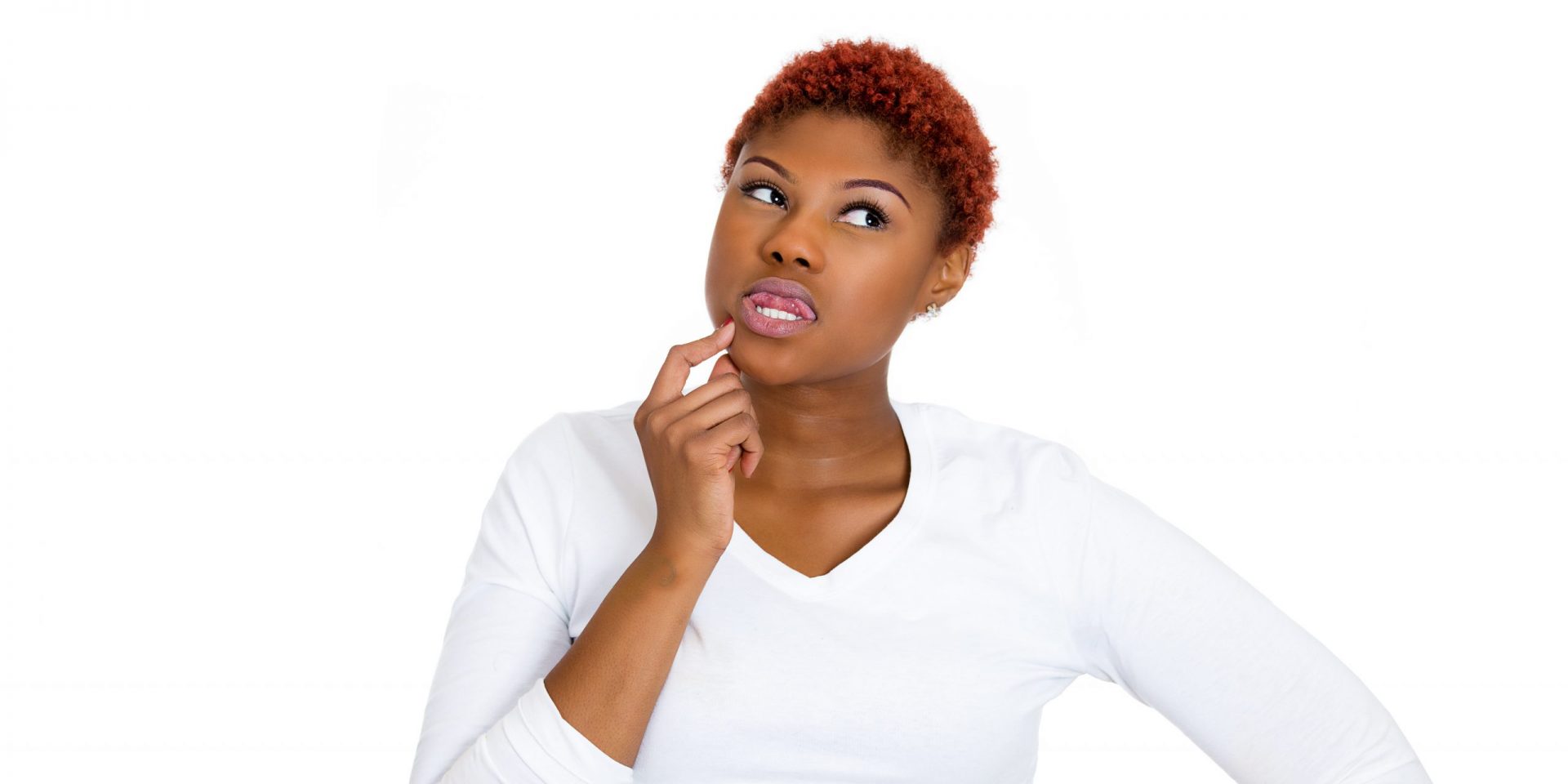 Thinking woman with red hair