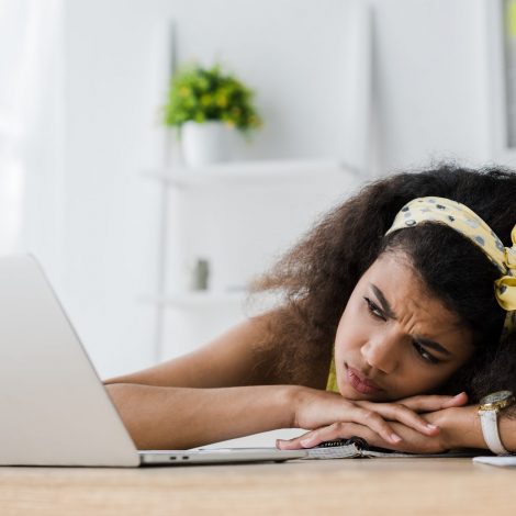 Annoyed woman on the computer