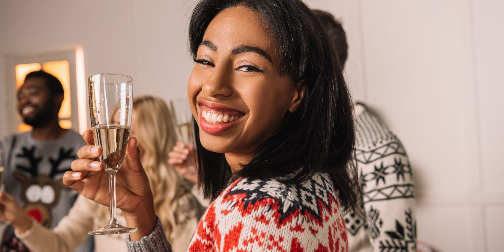 Woman holding champagne glass