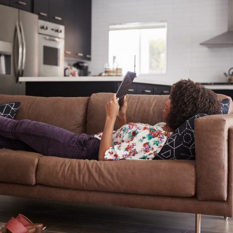 Woman on the couch with her tablet