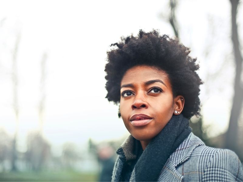 Woman with a winter coat and scarf