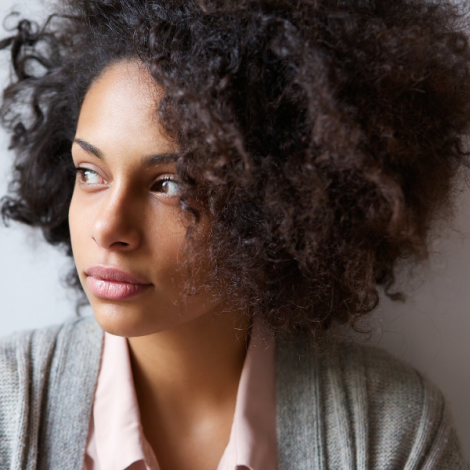 Woman gazing out of a window
