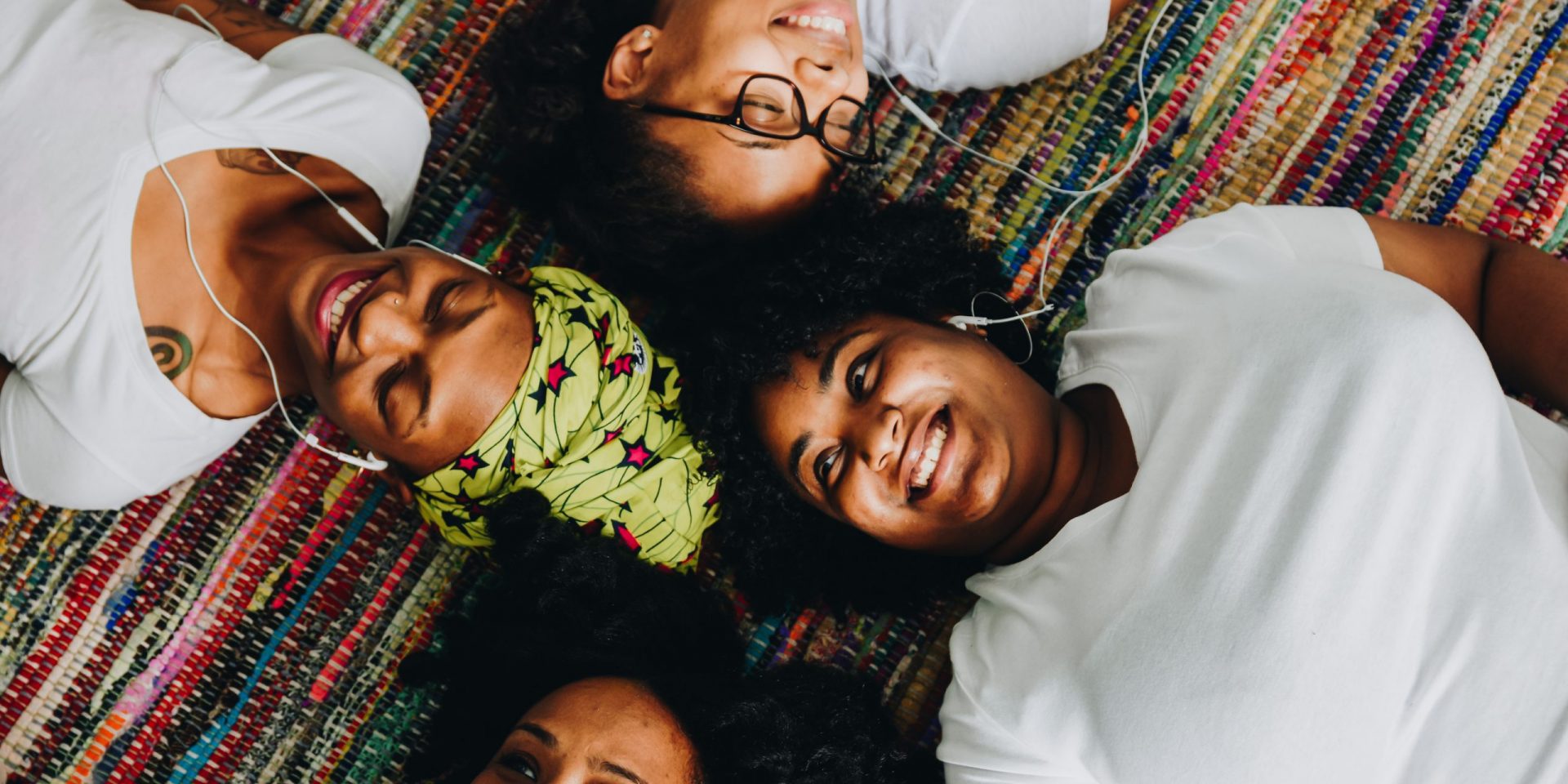 Friends listening to music on the floor
