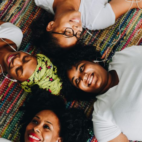 Friends listening to music on the floor