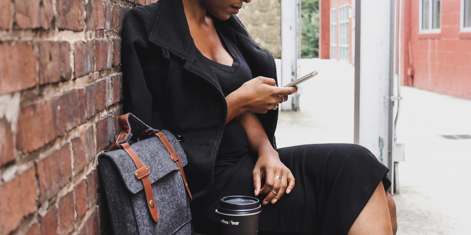 Woman on the phone on a bench