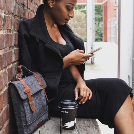 Woman on the phone on a bench