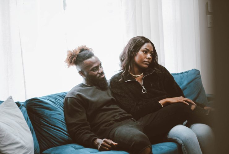 Couple sitting on couch
